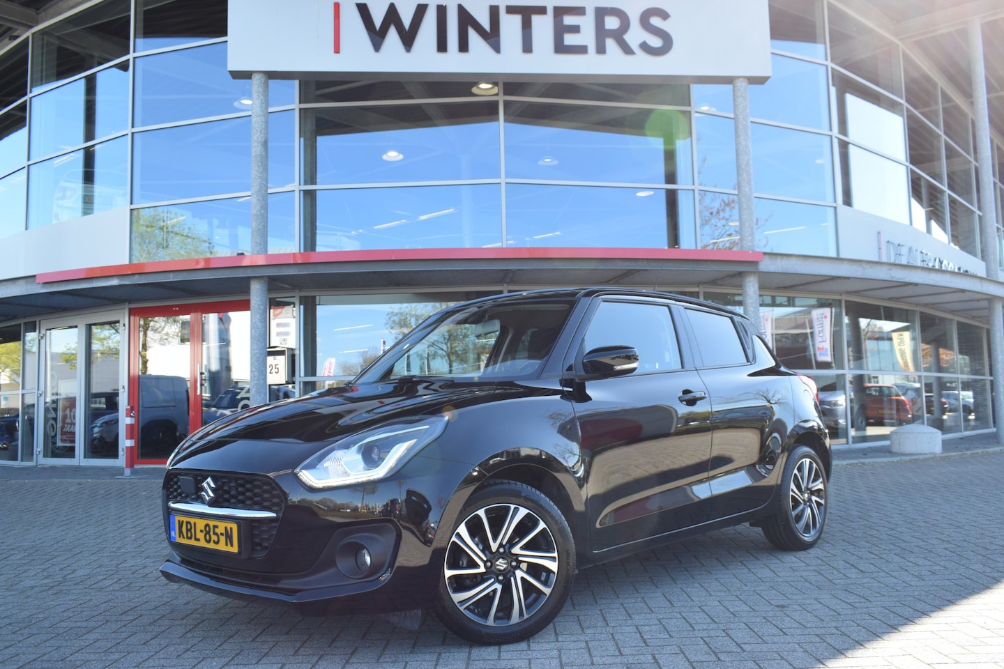 Suzuki Swift - 1.2 Style Smart Hybrid | Navigatie | Camera | Sensoren | Stoelverwarming | Cruise Control - AutoWereld.nl