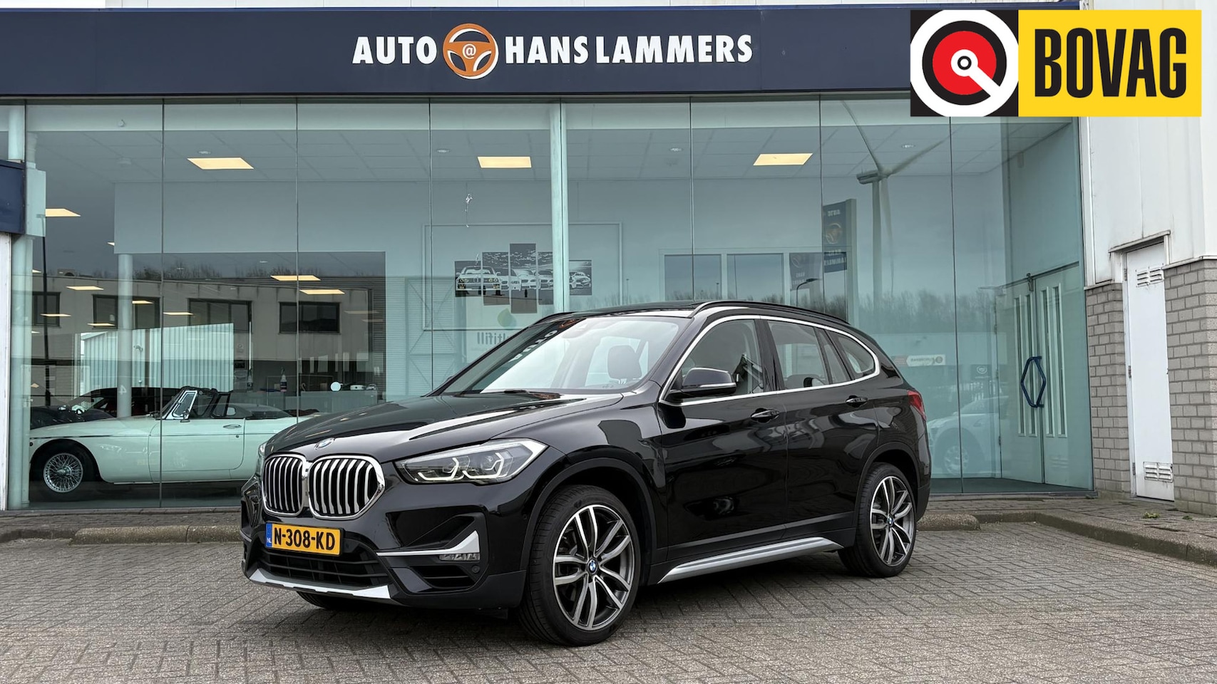 BMW X1 - sDrive18i High Executive Schuifdak, trekhaak, leer - AutoWereld.nl