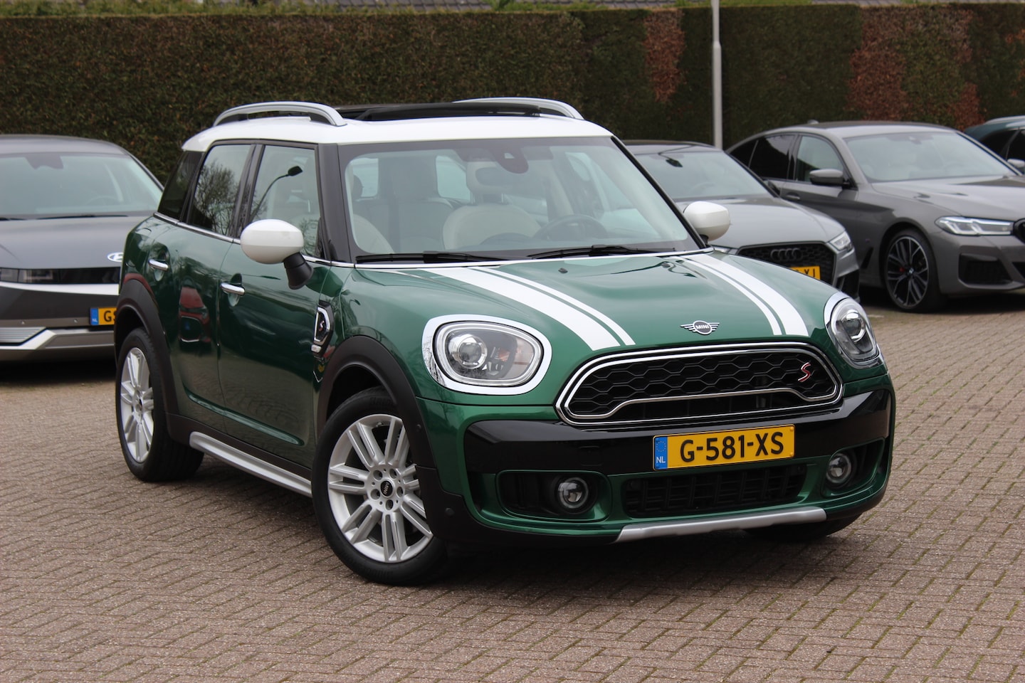 MINI Countryman - Mini 2.0 Cooper S Chili / Panoramadak / Camera / Head-up / Beige Leder / Navigatie / 18'' - AutoWereld.nl