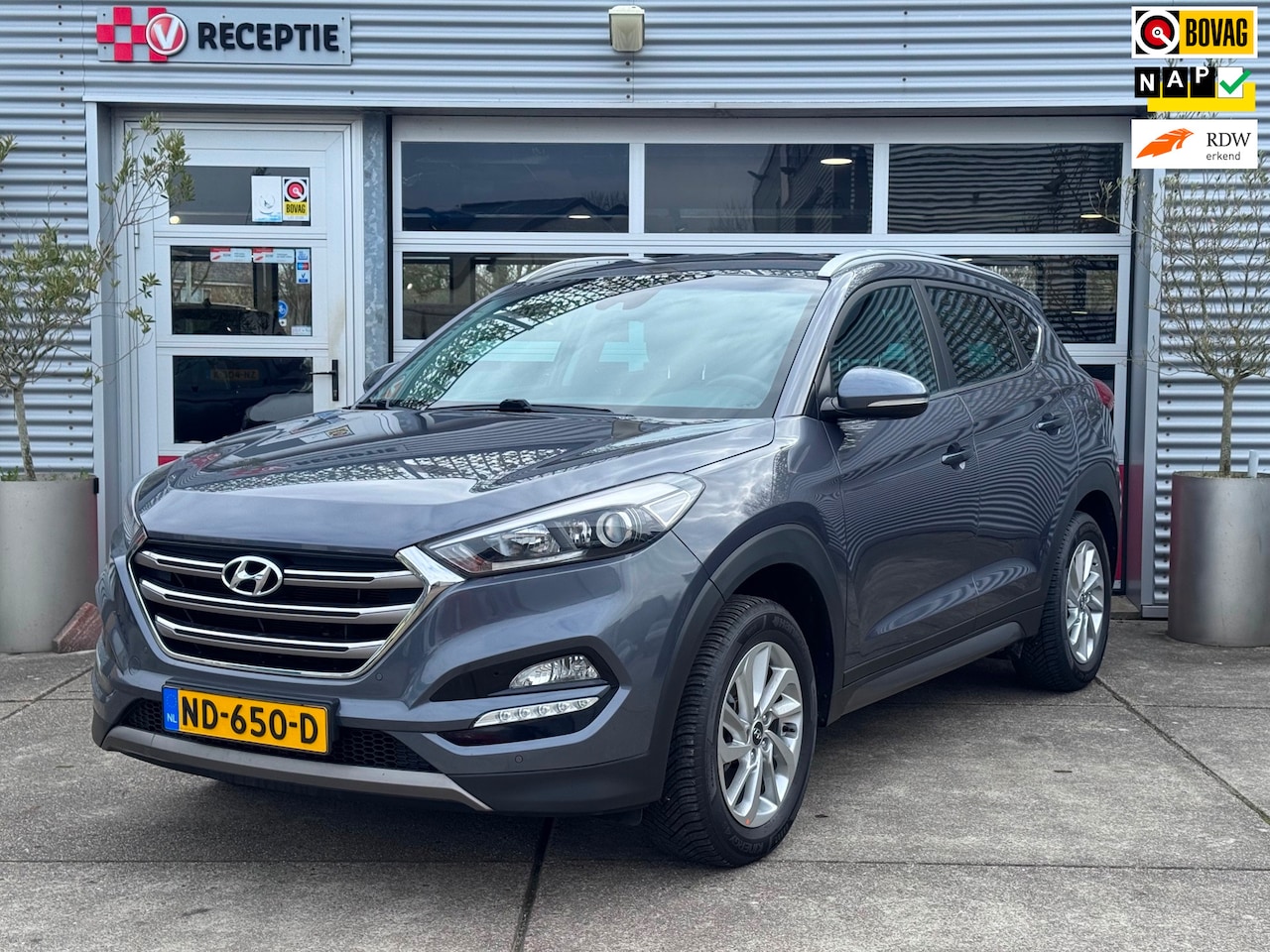 Hyundai Tucson - 1.6 GDi Comfort Navi / Camera / Trekhaak / Org-Ned - AutoWereld.nl