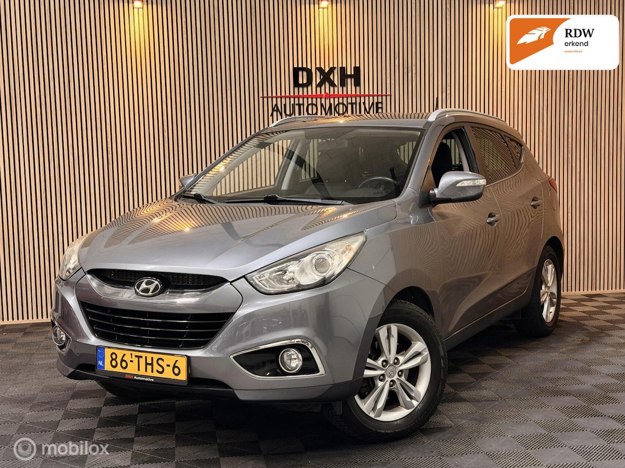 Hyundai ix35 - 1.6i GDI Dynamic 2eEIGNR! NAP APK4/2027 NAVI BT - AutoWereld.nl