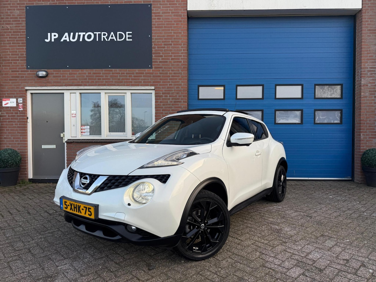 Nissan Juke - 1.2 DIG-T S/S Tekna | Pano | Led | Leer | NL - AutoWereld.nl