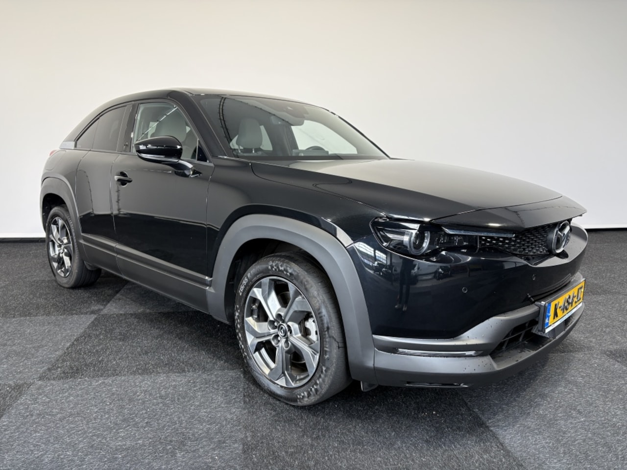 Mazda MX-30 - e-SkyActiv 1stEd SOH 92% Car play Head up display cruise control - AutoWereld.nl