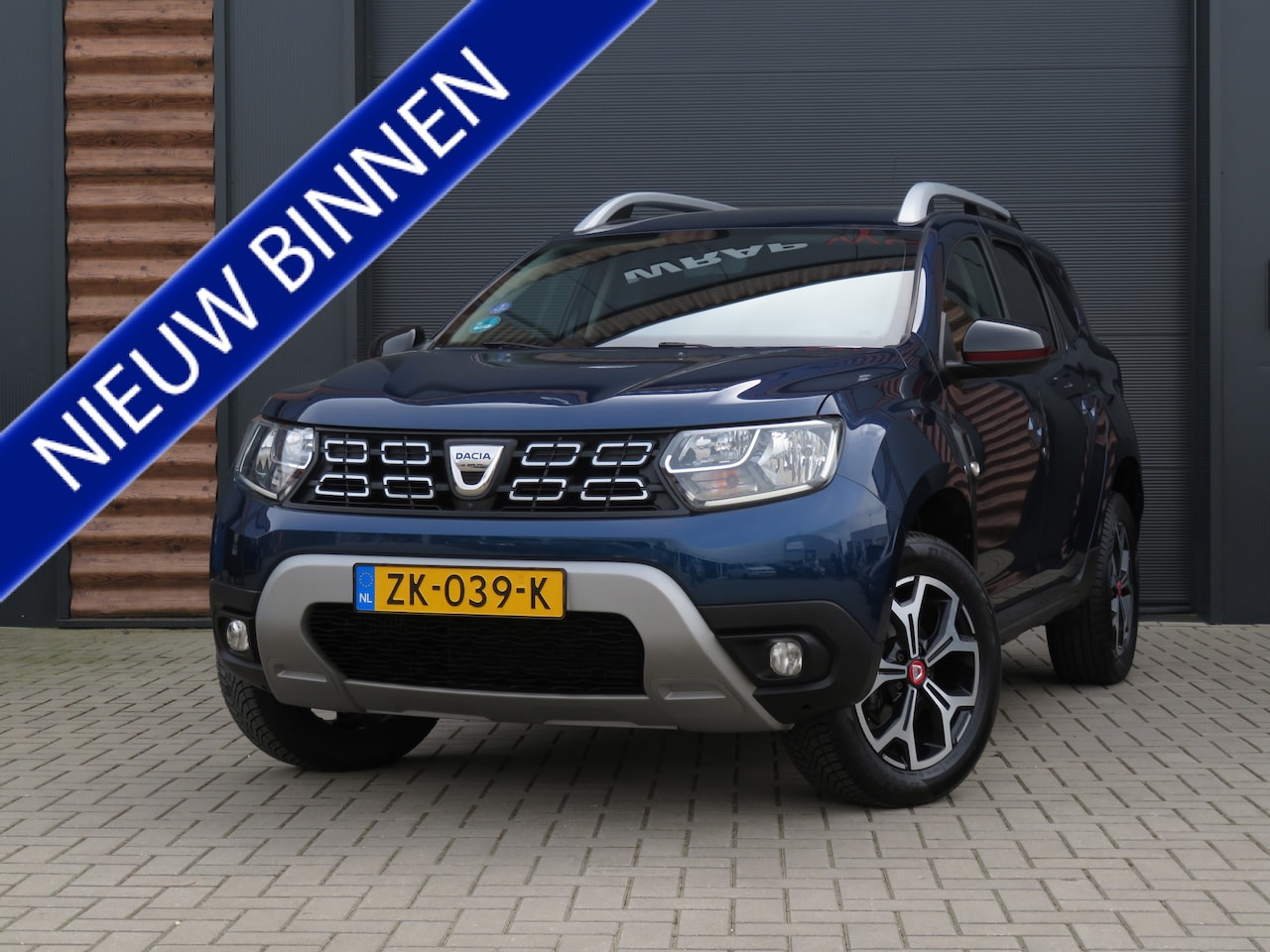 Dacia Duster - 1.3 TCe Tech Road 150PK Airco Cr-Control CarPlay Trekhaak - AutoWereld.nl