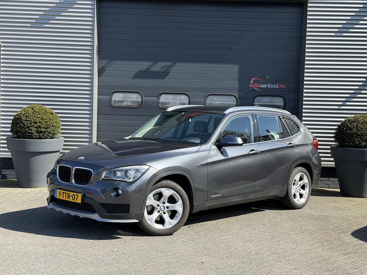 BMW X1 - sDrive20d Executive | Navigatie | Cruise Control | Xenon | Trekhaak | - AutoWereld.nl