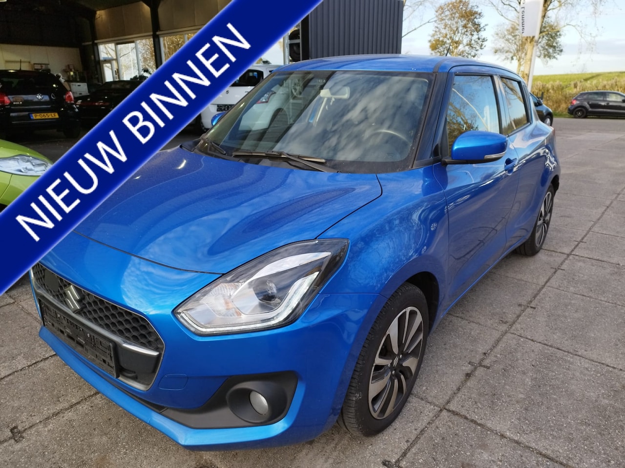 Suzuki Swift - 1.0 Boosterjet 110 PK ** Smart Hybrid NAVI ** Cruise ** Bluetooth ** Lm velgen ** - AutoWereld.nl
