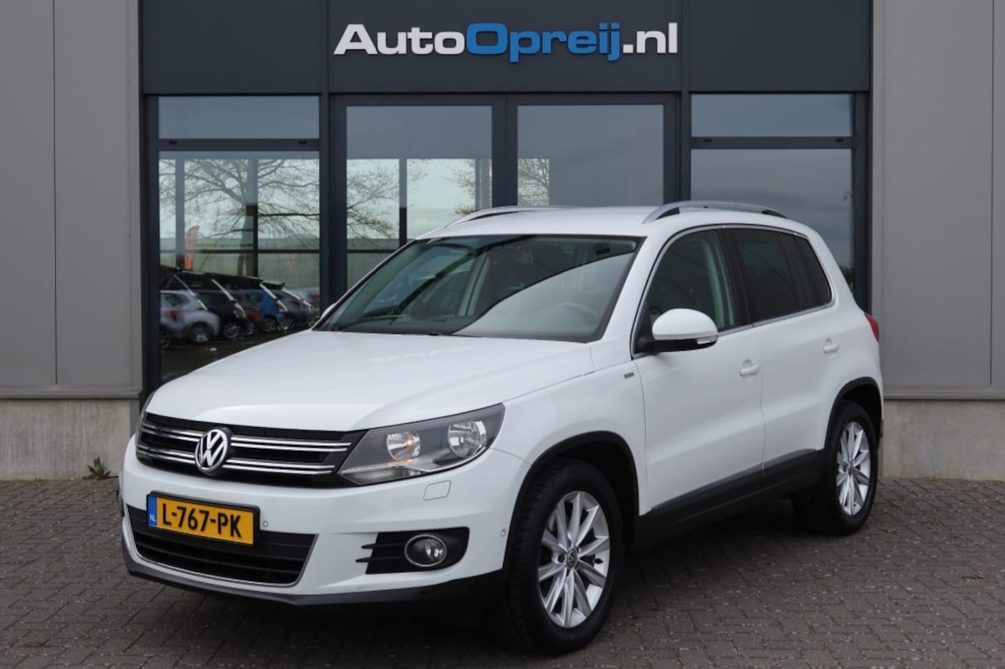 Volkswagen Tiguan - 1.4 TSI 160pk Life Clima, NAVI, Cruise - AutoWereld.nl