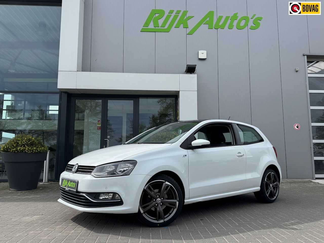 Volkswagen Polo - 1.2 TSI Comfortline * PDC 2X * Airco * L.M. Velgen - AutoWereld.nl