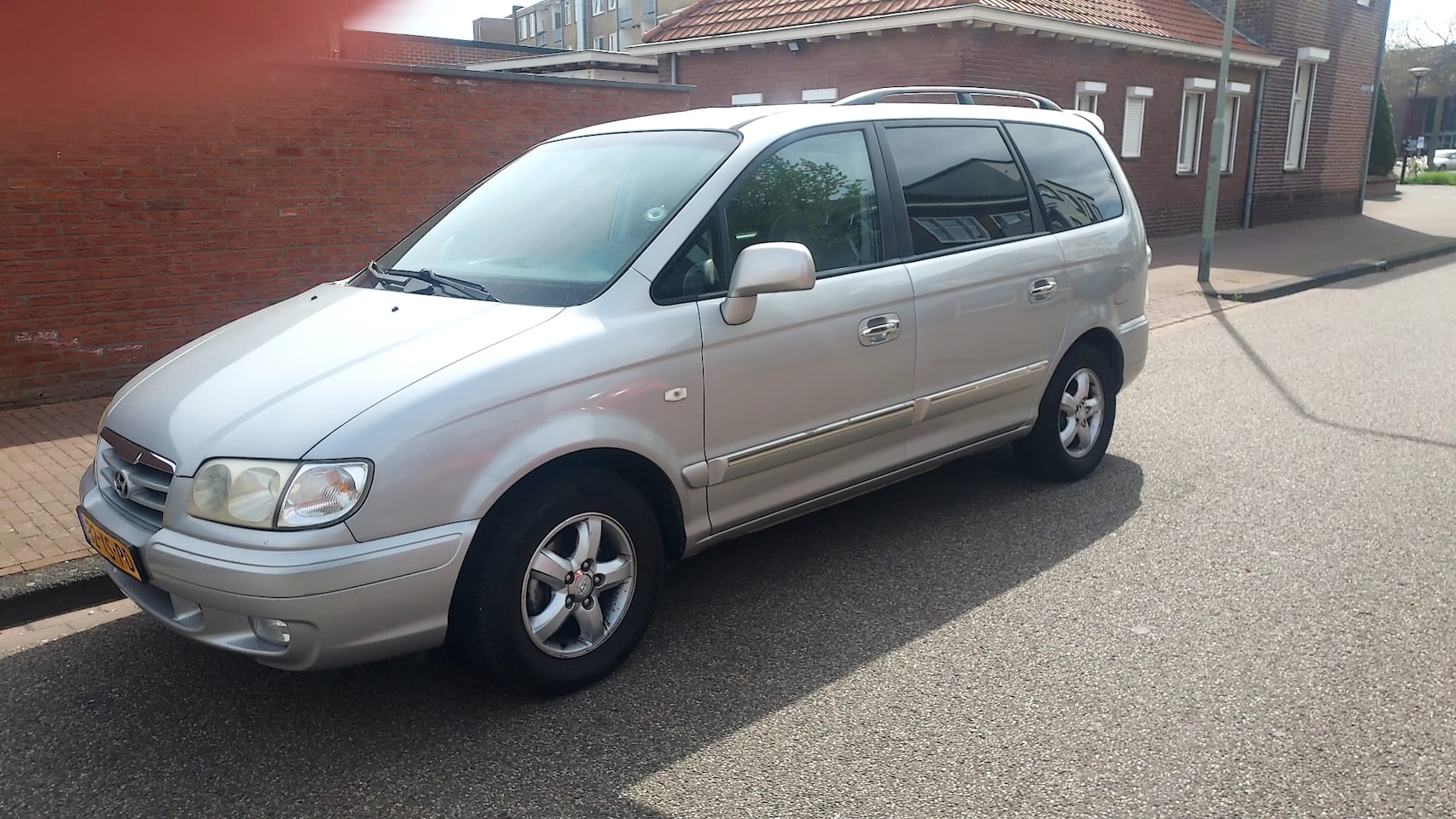 Hyundai Trajet - 2.0i CVVT Dynamic 7p. Met parkeersensoren  Cruise control en stoelverwarming - AutoWereld.nl