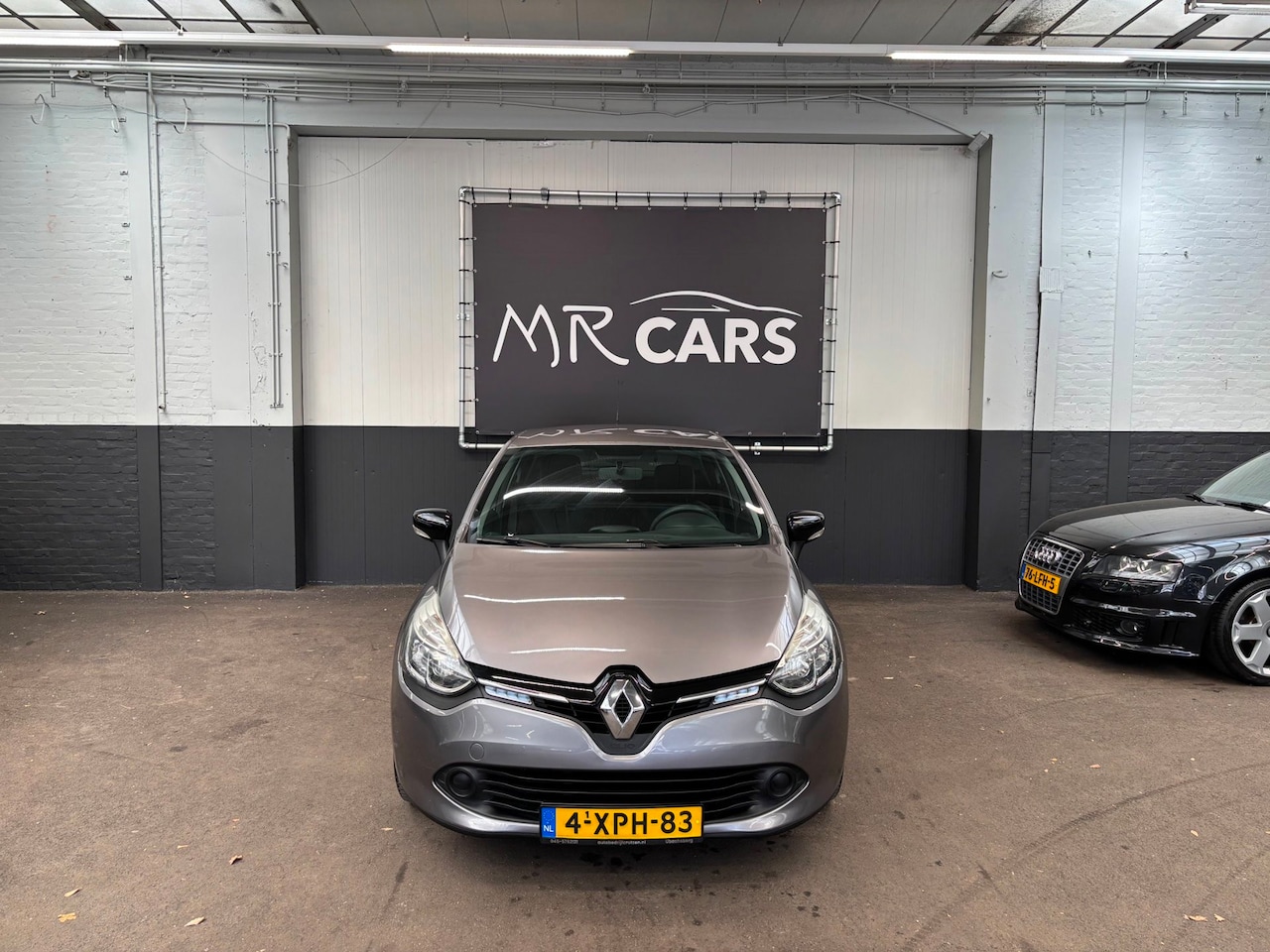 Renault Clio - 1.2 Expression Navi/Airco/Cruise Control - AutoWereld.nl