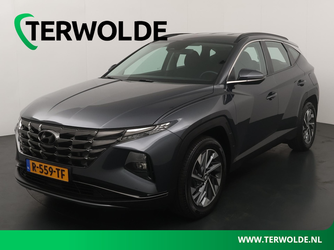 Hyundai Tucson - 1.6 T-GDI MHEV i-Motion | Parkeercamera | Climate control | Apple carplay Android auto - AutoWereld.nl