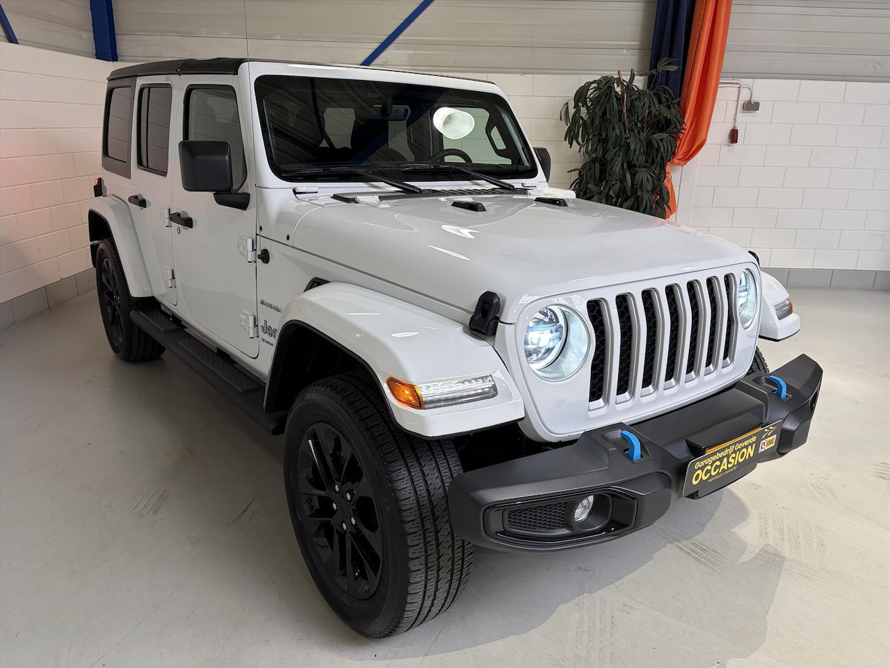 Jeep Wrangler - 4xe PHEV 380pk 4D Aut. Sahara, NWST, VOL, LEDER - AutoWereld.nl