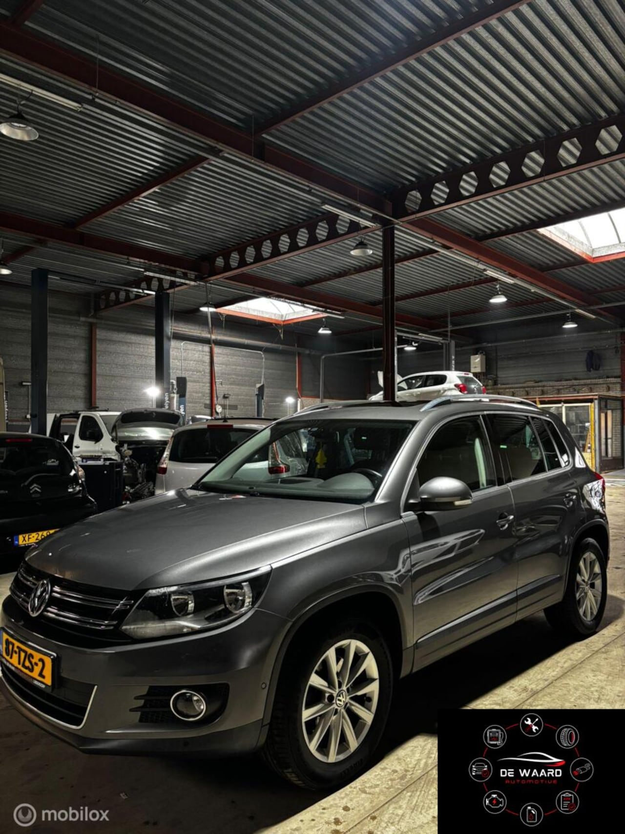 Volkswagen Tiguan - 2.0 TSI Sport&Style 4Motion - AutoWereld.nl