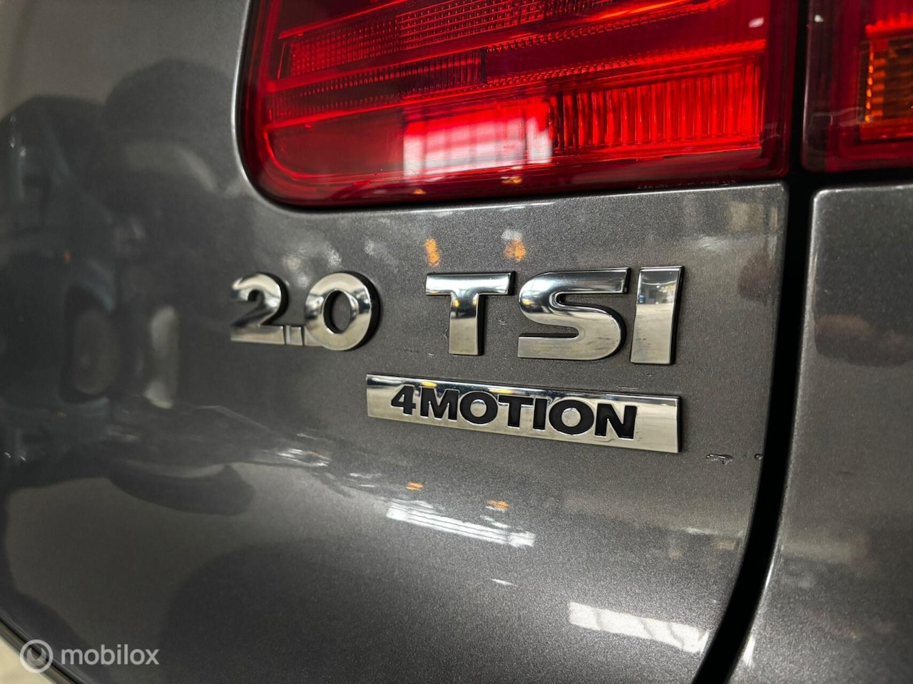 Volkswagen Tiguan - 2.0 TSI Sport&Style 4Motion - AutoWereld.nl