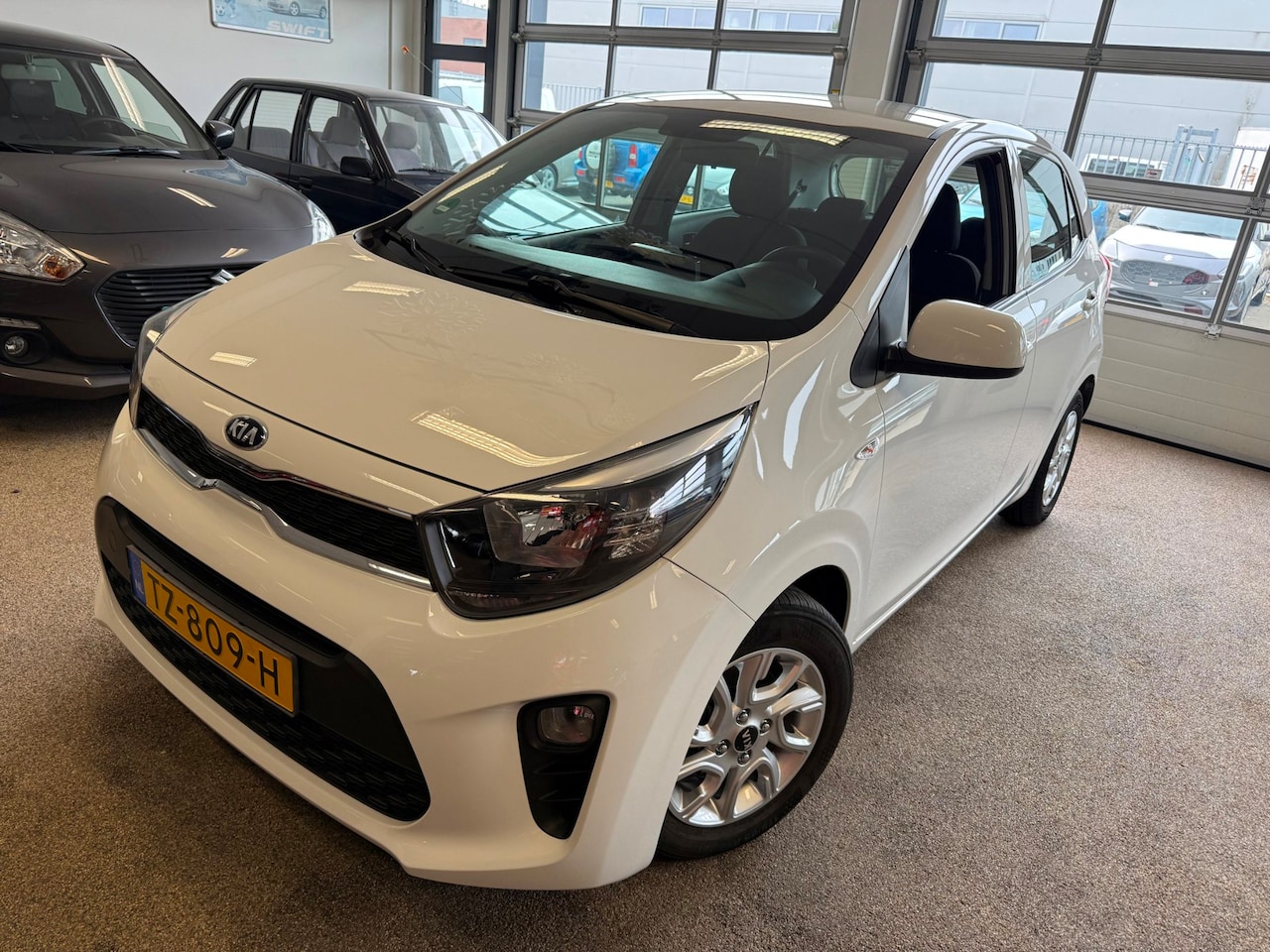 Kia Picanto - 1.0 CVVT ComfortPlusLine Navigator 1.0 CVVT ComfortPlusLine Navigator - AutoWereld.nl