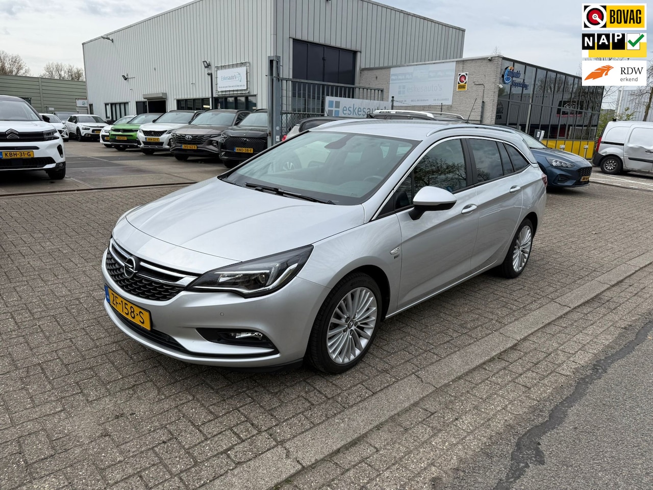 Opel Astra Sports Tourer - 1.4 Turbo 120 Jaar Edition 1.4 Turbo 120 Jaar Edition, Navi, NAP, 150pk - AutoWereld.nl