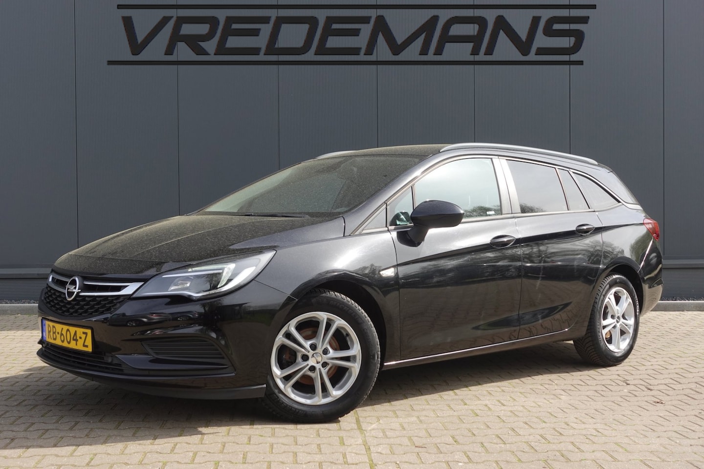 Opel Astra Sports Tourer - 1.0 Online Edition NAVI - AutoWereld.nl