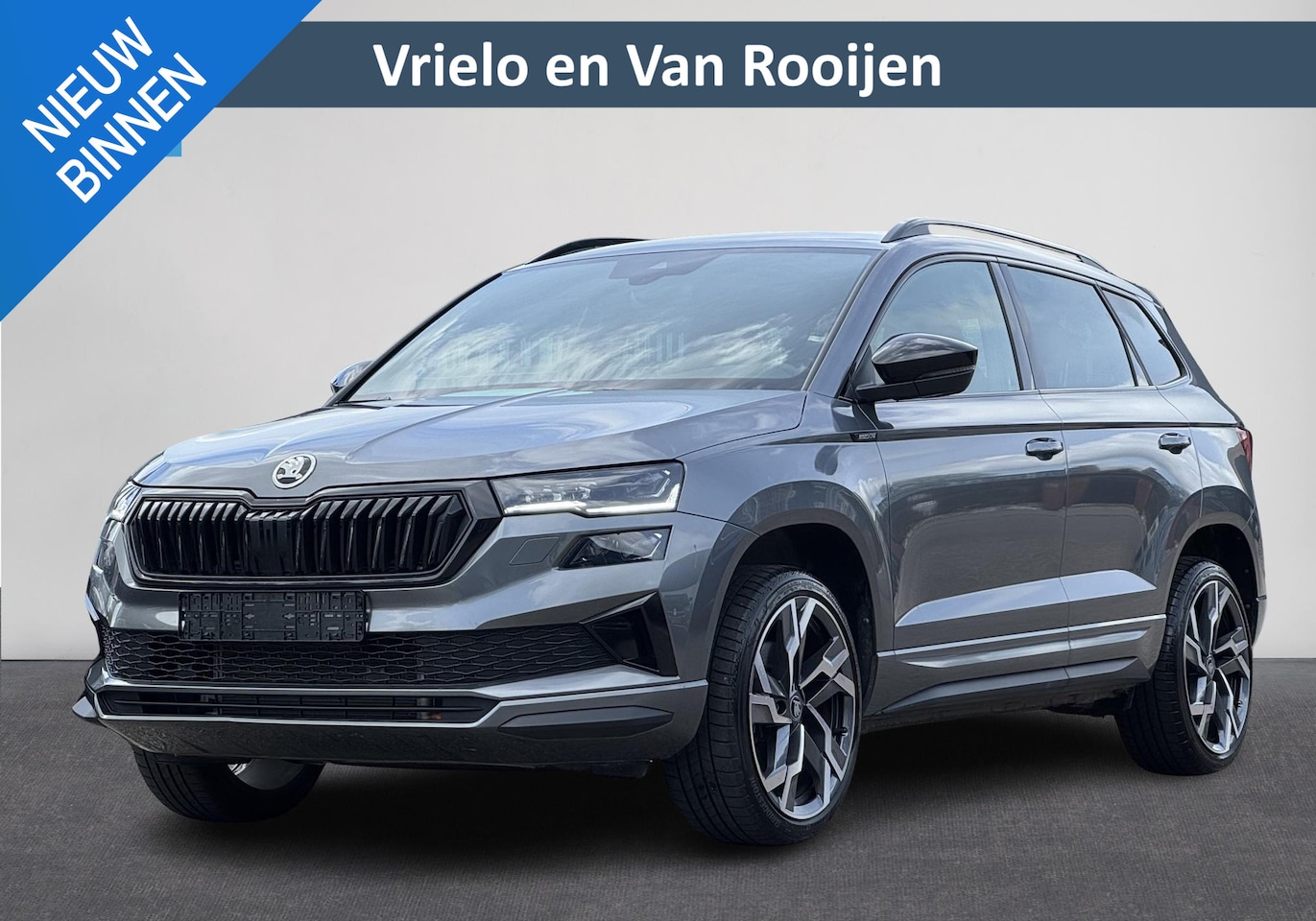 Skoda Karoq - 1.5 TSI Sportline | Automaat | Clima | Stuur/Stoelverwarming | Cruise | Carplay | Navi | P - AutoWereld.nl