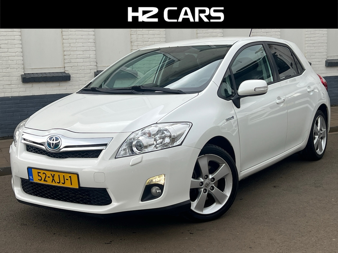 Toyota Auris - 1.8 Full Hybrid Executive/Camera/Leder/Navi/PDC/Cruise/Clima - AutoWereld.nl