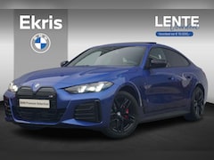 BMW i4 - eDrive40 M Sportpakket Pro | Schuif-/kanteldak | Active Cruise Control | Verwarmde stoelen