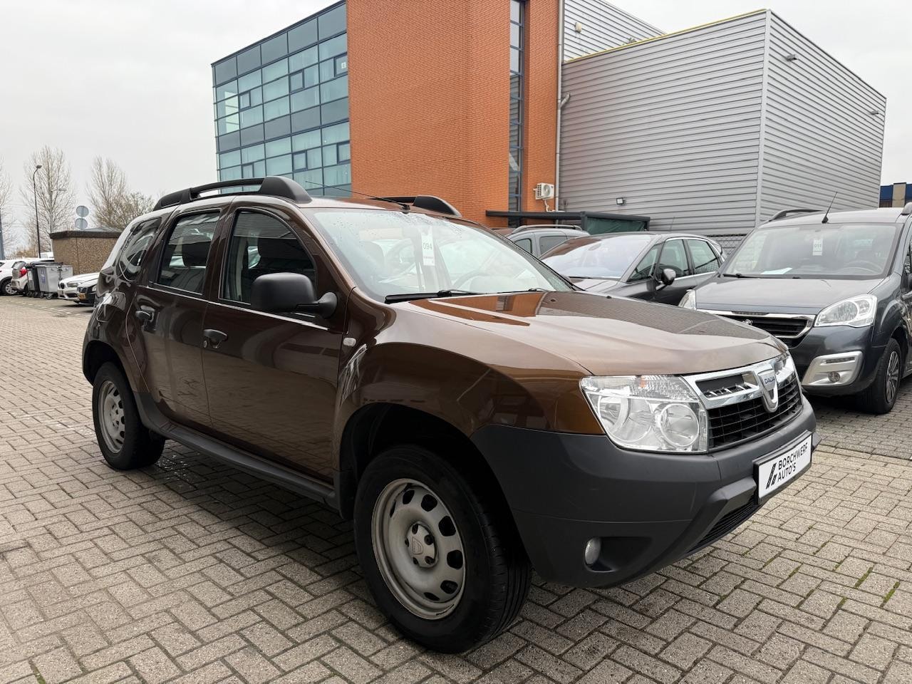 Dacia Duster - 1.6 Benzine | Trekhaak| Lage km's | Hoge instap - AutoWereld.nl