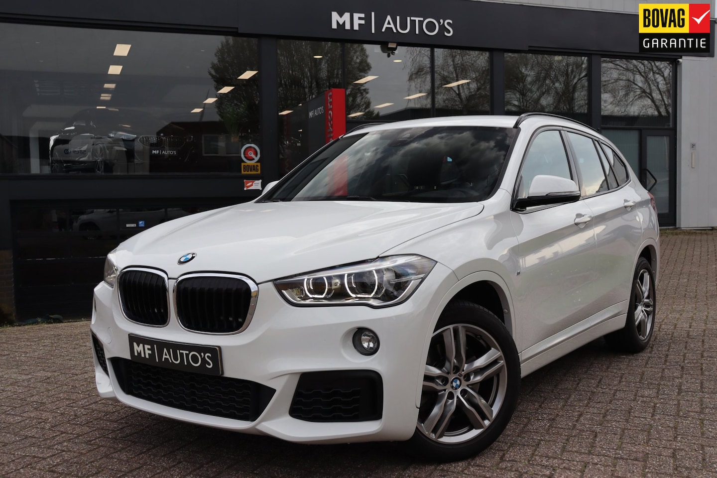 BMW X1 - SDrive20i High Executive M Sport 192PK|Led|PDC|Navi|Camera - AutoWereld.nl