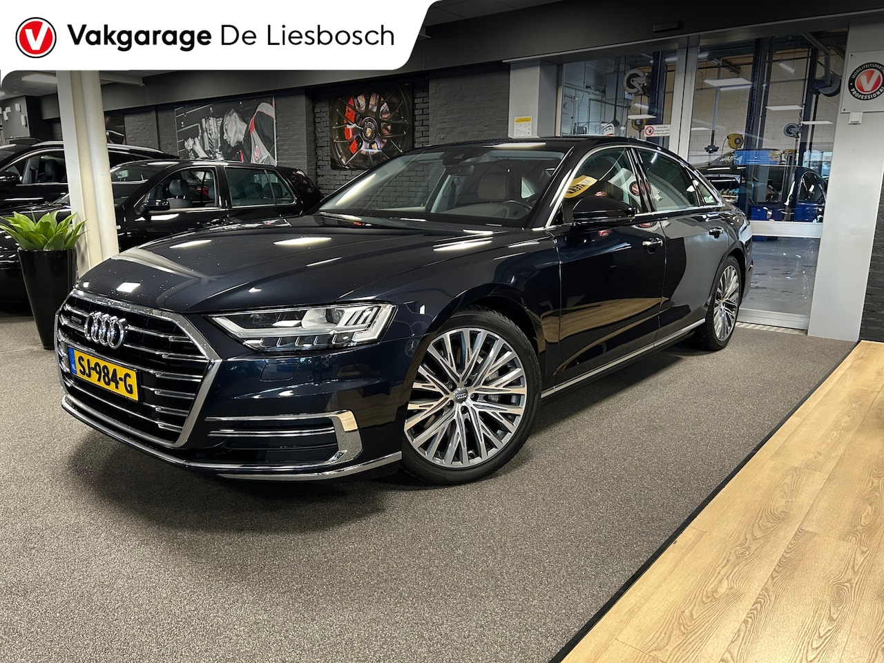 Audi A8 - 55 TFSI quattro / Leder / Navigatie / 20inch / B&O / stoel verwarming voor + achter. - AutoWereld.nl
