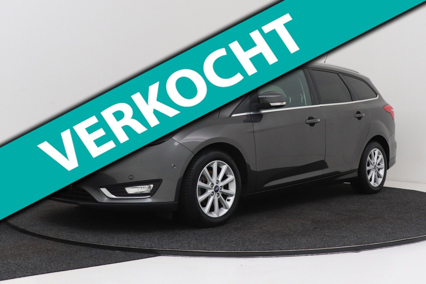 Ford Focus Wagon - 1.0 Titanium | Trekhaak | Dealer Ond. | 125 PK | Navigatie | Climate Control | Winter Pack - AutoWereld.nl