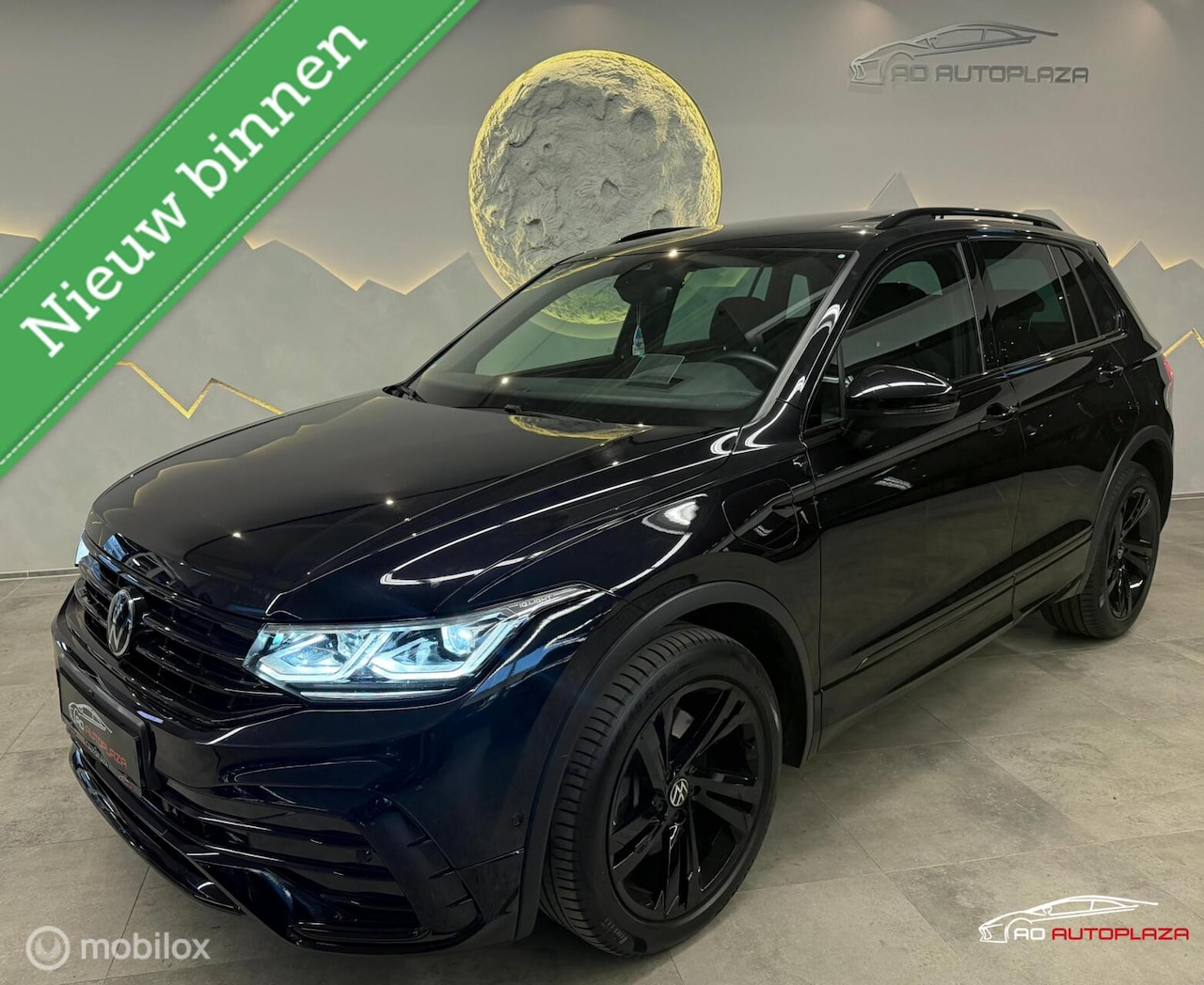 Volkswagen Tiguan - 1.4 TSI Hybrid R-Line Panorama/Keyless/HUD/Black style - AutoWereld.nl
