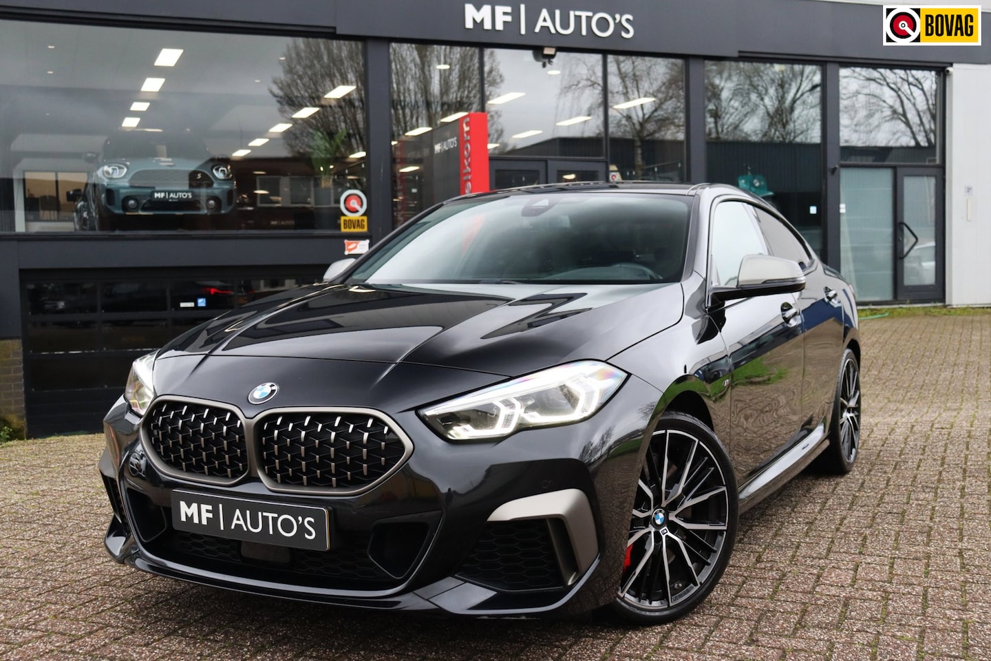 BMW 2-serie Gran Coupé - M235i xDrive High Executive Edition|H&K|Leder|Schaalstoel|Keyless - AutoWereld.nl