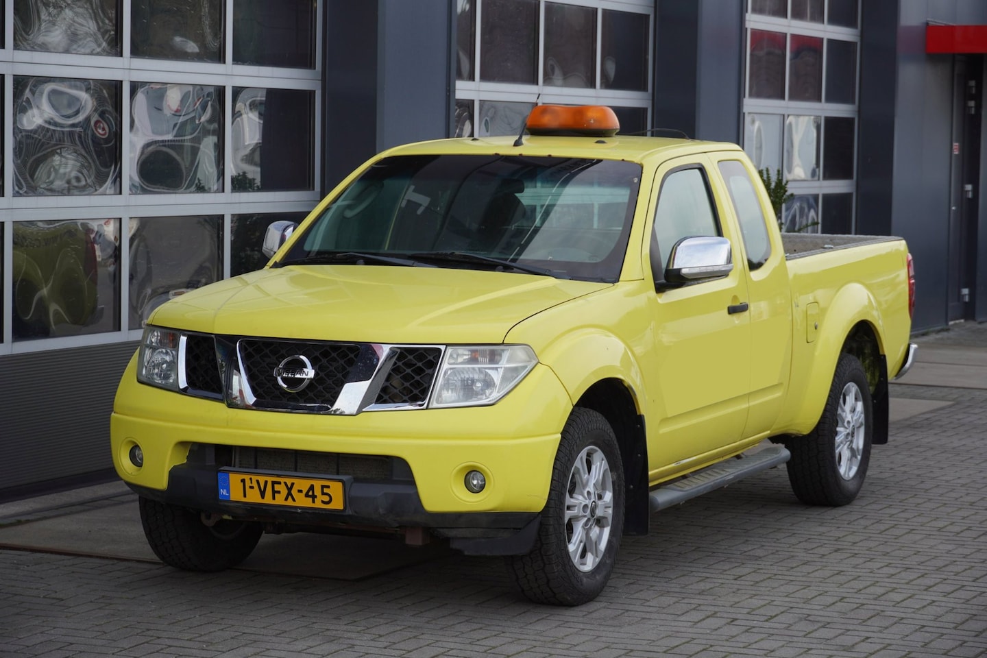 Nissan Navara - 2.5 dCi LE 177PK King Cab 4WD - AutoWereld.nl