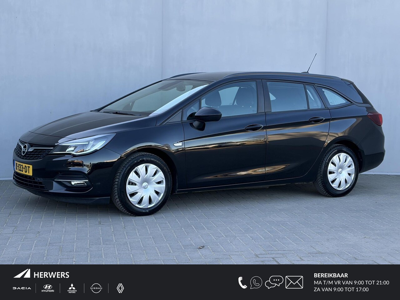 Opel Astra Sports Tourer - 1.2 Business Executive / Achteruitrijcamera / Navigatie /  Apple Carplay & Android Auto / - AutoWereld.nl