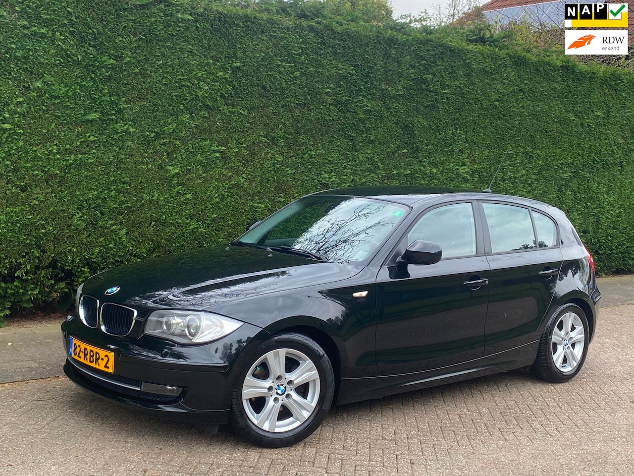 BMW 1-serie - 118i AIRCO/CLIMATRONIC/NAVI/LEER/XENON/NL AUTO!! - AutoWereld.nl