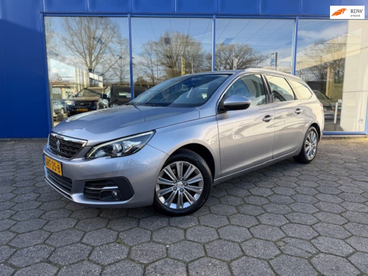 Peugeot 308 SW - 1.2 PureTech Blue Lease Premium Automaat - Navi - AutoWereld.nl