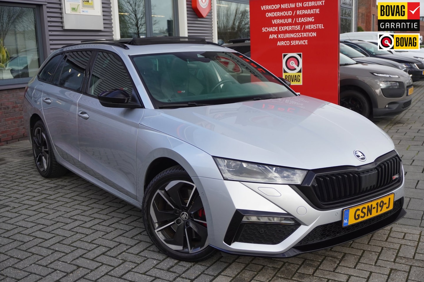 Skoda Octavia Combi - 1.4 TSI RS iV PHEV Business / Pano / Massage / HUD / Carplay / Camera / Memory - Zeer nett - AutoWereld.nl
