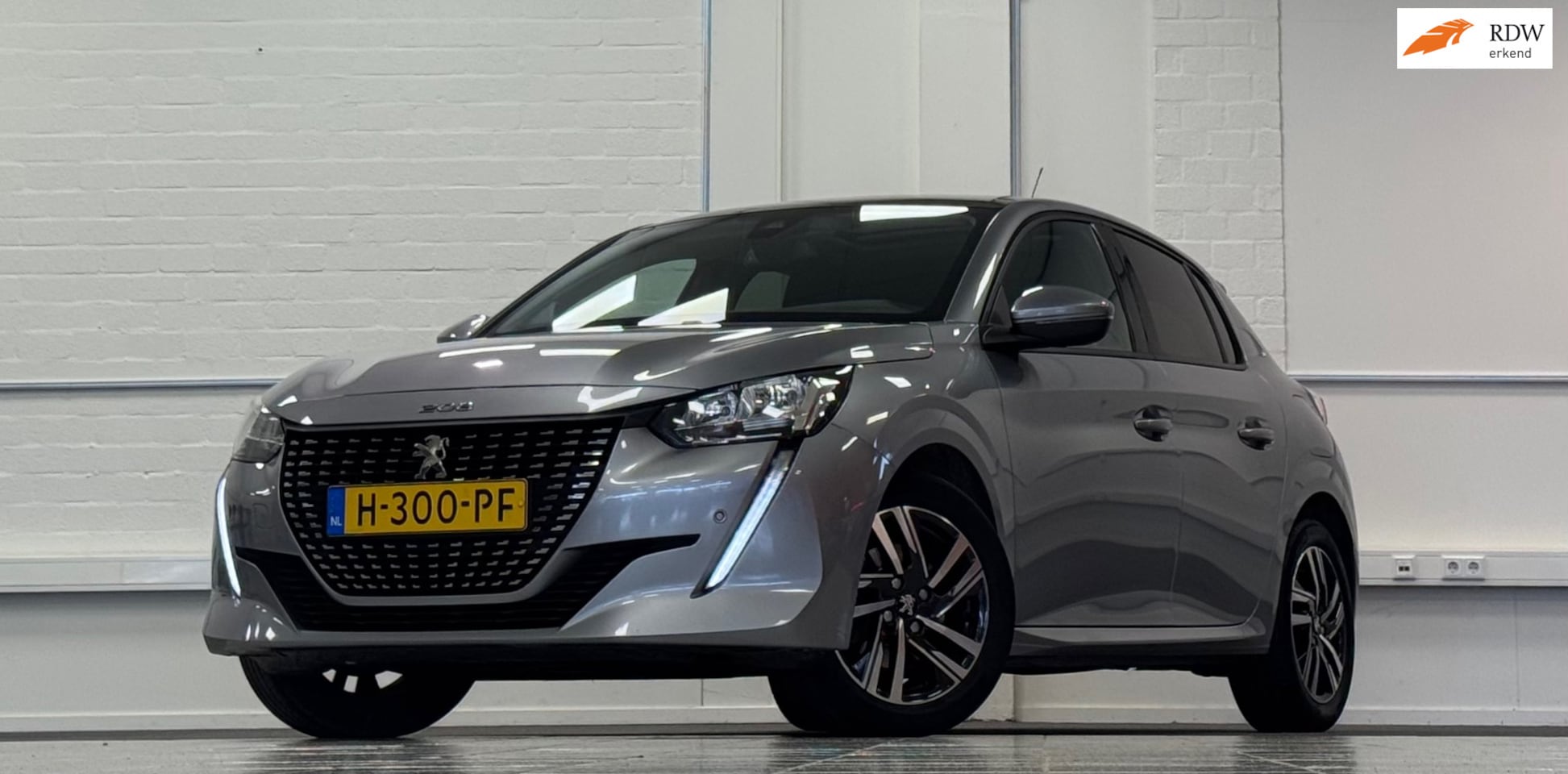 Peugeot 208 - 1.2 PureTech Allure 1e Eigenaar Camera Navi Parkeerhulp - AutoWereld.nl