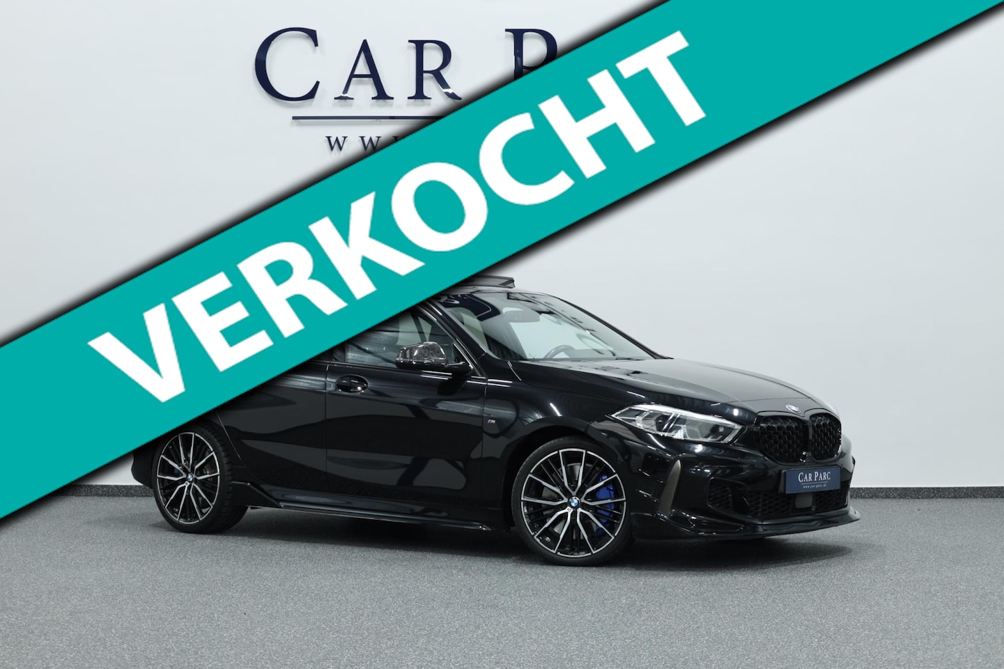 BMW 1-serie - M135i xDrive 306+PK M-PERFORMANCE/FORGED CARBON/VIRTUAL/SFEER/LEER+S.VERWARMING+MEMORY/LMV - AutoWereld.nl