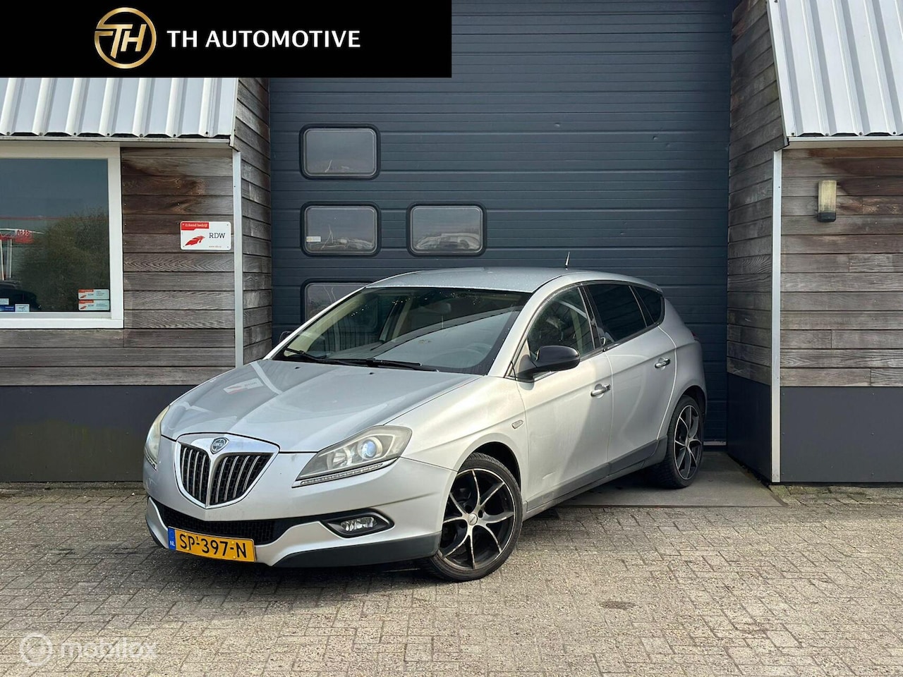 Lancia Delta - 1.4-16V Argento| Airco | Cruise |Lane Assist. - AutoWereld.nl