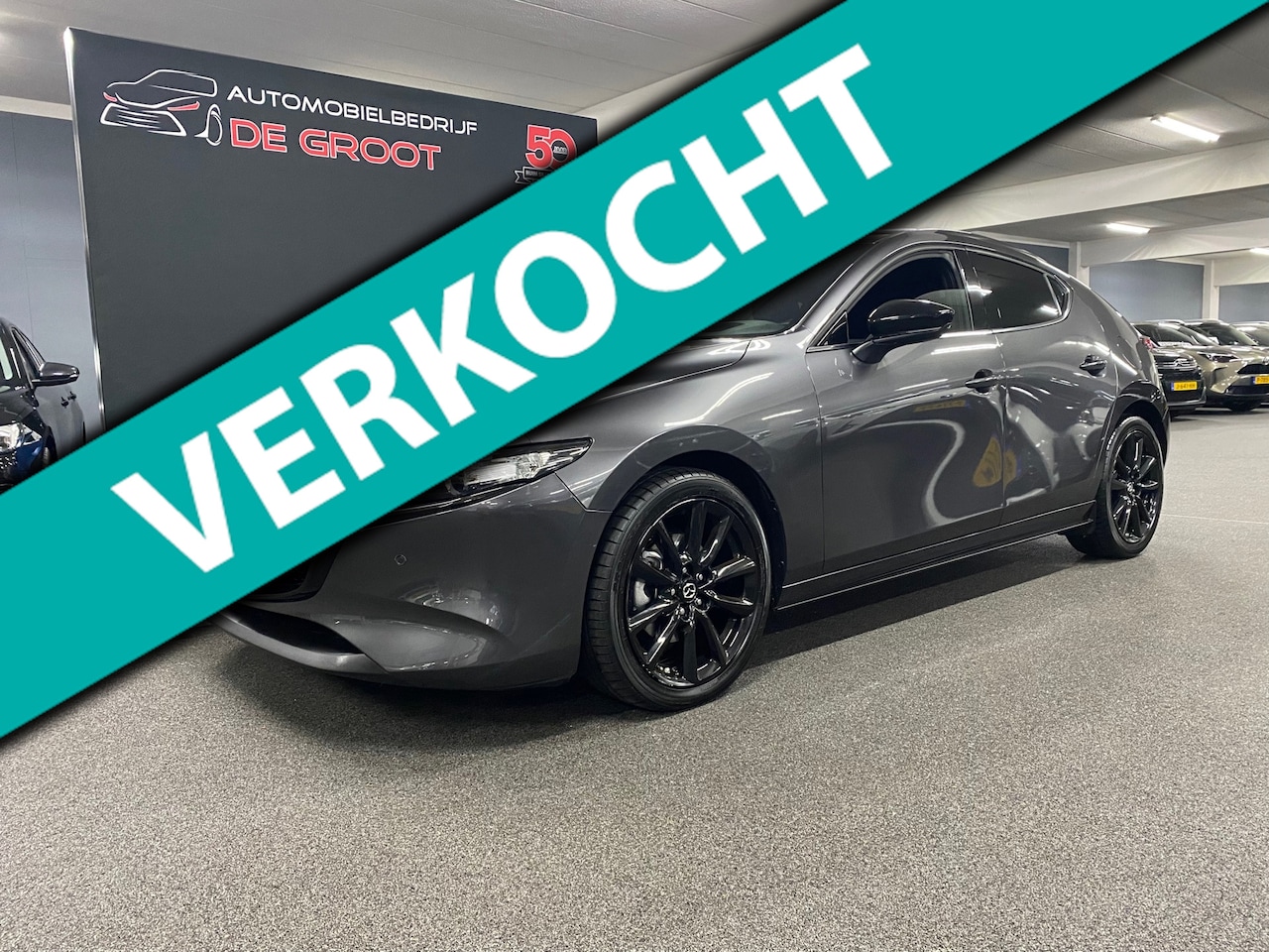 Mazda 3 - 2.0 e-SkyActiv-G M Hybrid 150 Homura/ Nederlandse auto/ Parkeersensoren/ Achteruitrijcamer - AutoWereld.nl