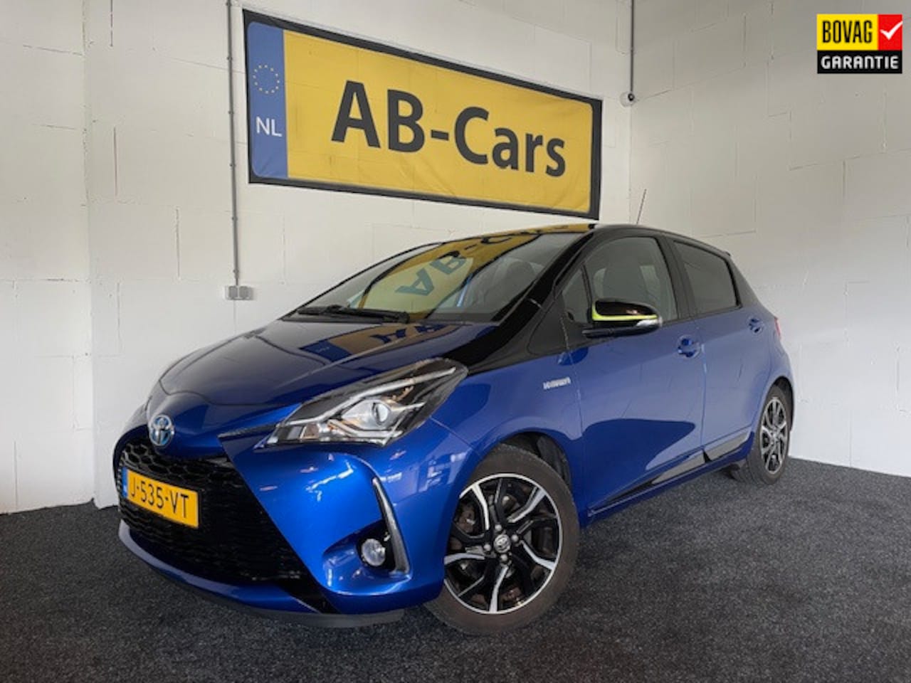 Toyota Yaris - 1.5 Hybrid Bi-Tone met Skyview Paroramadak - AutoWereld.nl