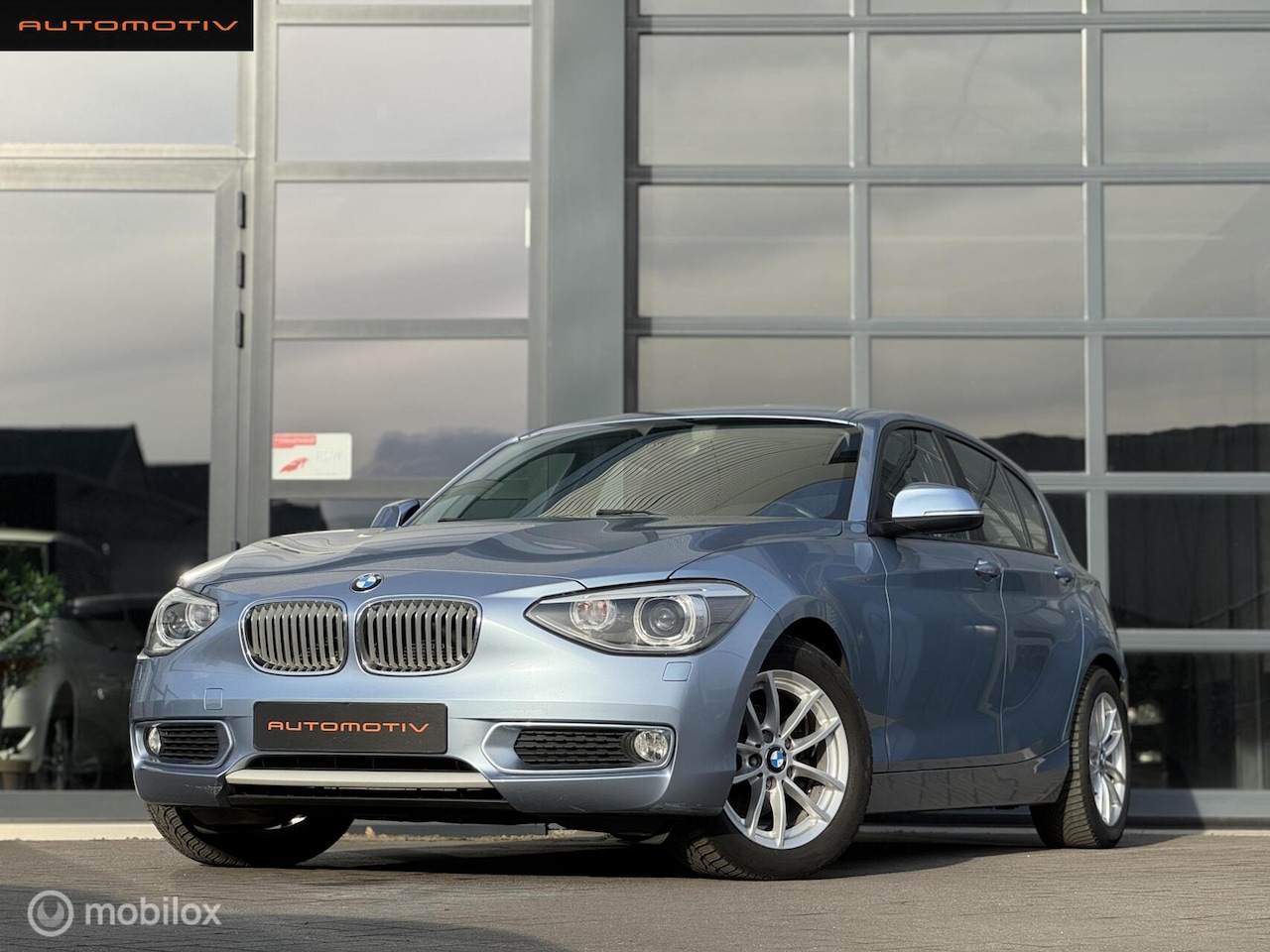 BMW 1-serie - 114i Urban Line BI XENON / NAVI / CRUISE - AutoWereld.nl
