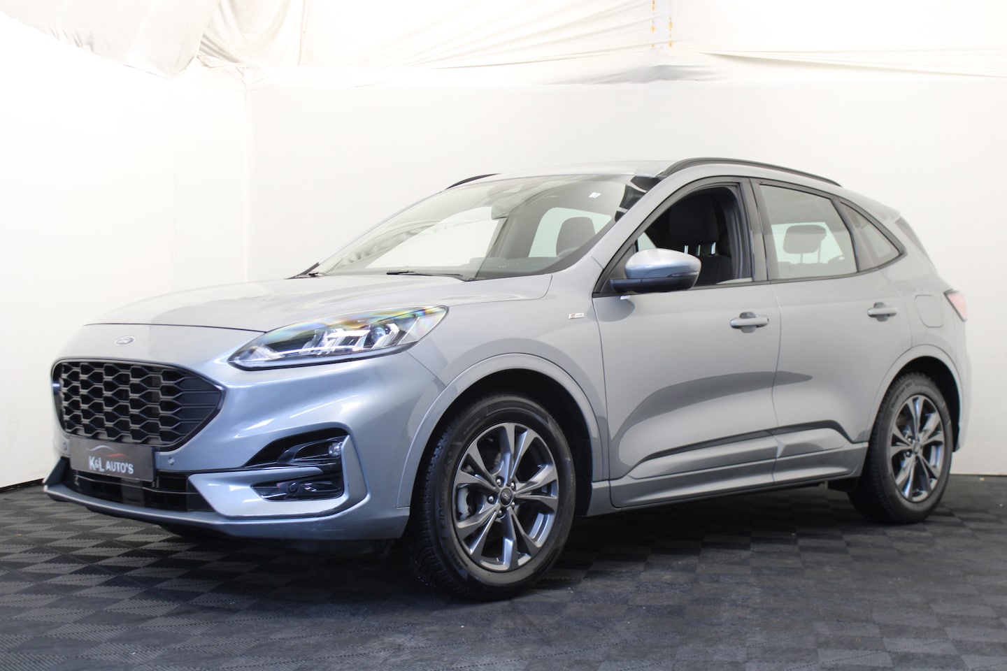 Ford Kuga - 2.5 FHEV ST-Line - AutoWereld.nl