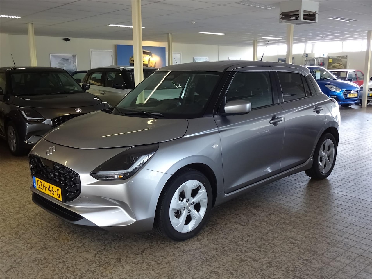 Suzuki Swift - 1.2 Smart Hybrid Select Weinig Kilometers Orig. NL - AutoWereld.nl