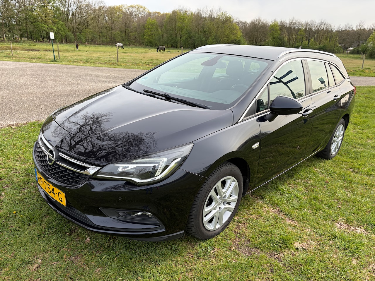 Opel Astra Sports Tourer - 1.0 Business+ Apple CarPlay, All Season banden, trekhaak - AutoWereld.nl