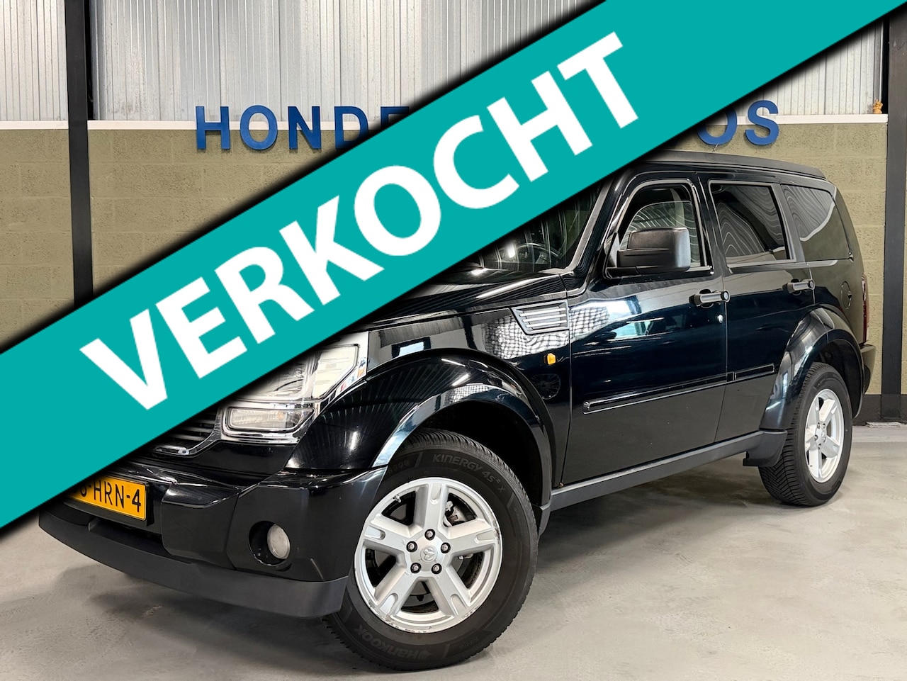 Dodge Nitro - 3.7 V6 SE SLT AROSA I TREKHAAK I ALL SEASON I 4X4 I NAVI I CRUISE I - AutoWereld.nl