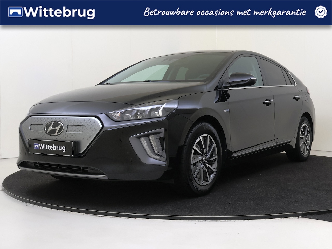 Hyundai IONIQ - Premium EV 38 kWh LEDER | FULL LED | 100% STATE OF HEALTH! - AutoWereld.nl