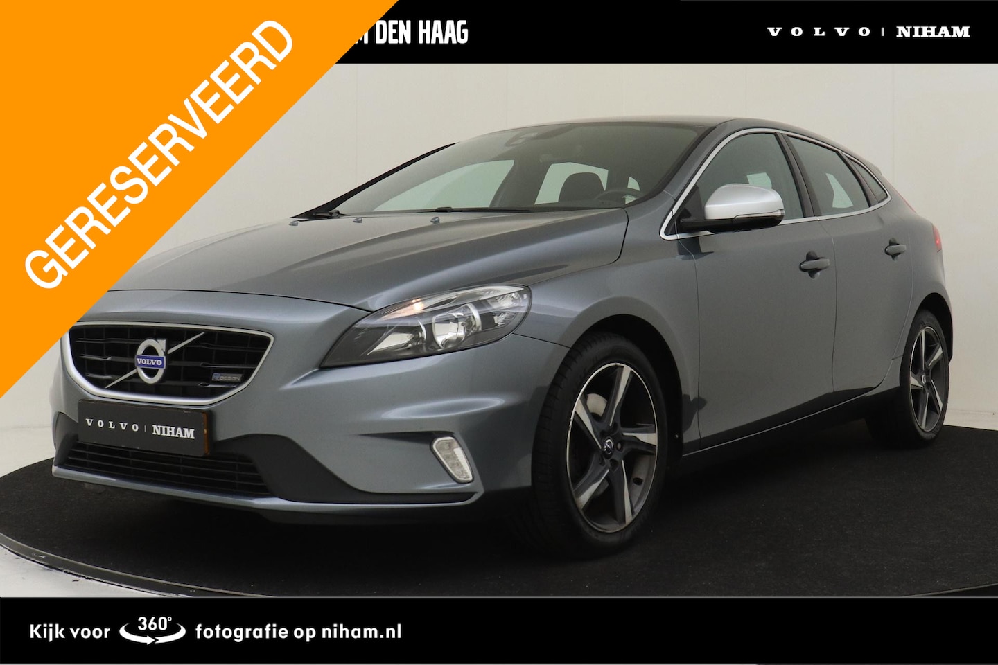 Volvo V40 - T2 (H) R-DESIGN -CRUISE|PDC|NAVI|ECC|REGENSENSOR|HIGH.PERF.AUDIO|AUTO.DIM - AutoWereld.nl