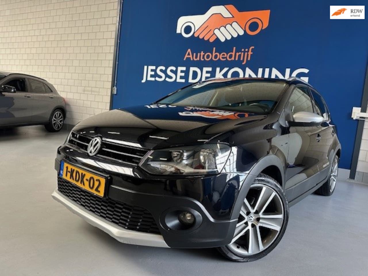 Volkswagen Polo - 1.2 TSI Cross / bj.2011 / zwart / 5 deurs / climate / sportvelgen / navigatie / APK 03/202 - AutoWereld.nl
