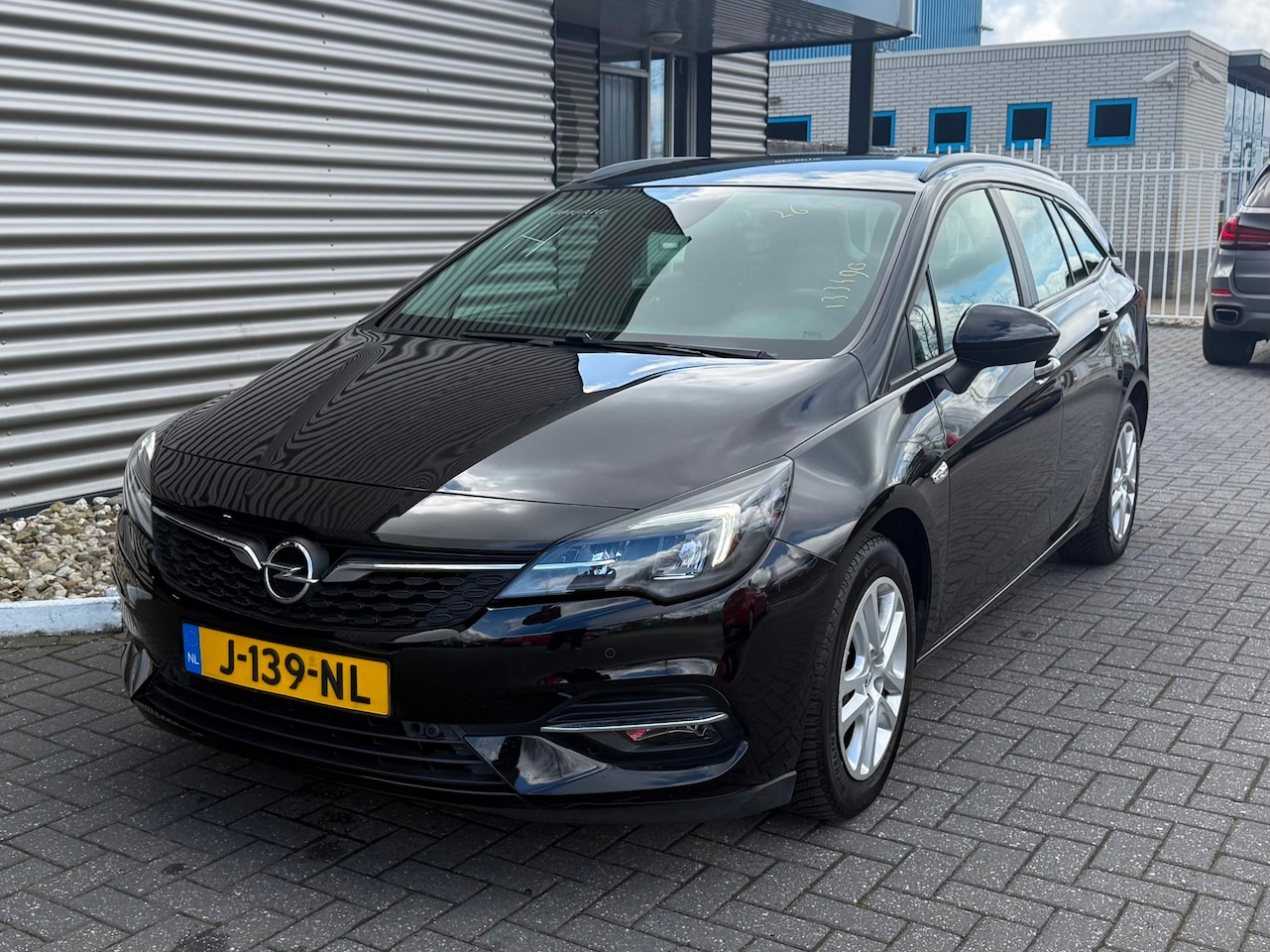 Opel Astra Sports Tourer - 1.2 Business Executive 1.2 Business Executive - AutoWereld.nl