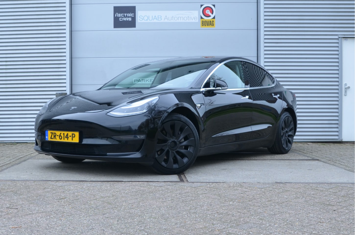 Tesla Model 3 - Long Range RWD Long Range AWD 75 kWh AutoPilot3.0 (Meerprijs FSD 99,- p/mnd), Fietshaak - AutoWereld.nl